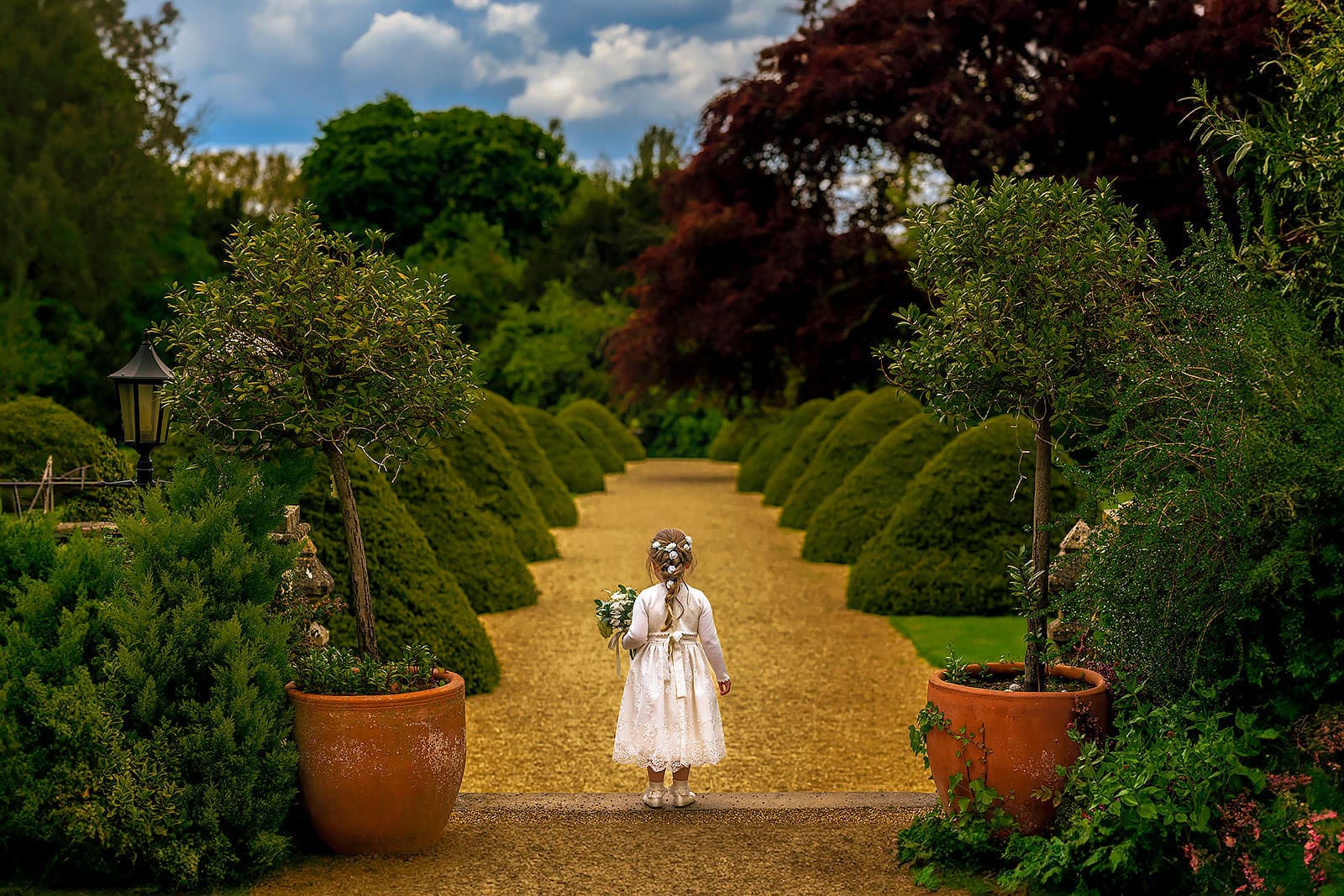 Flower girl at a Manor By The Lake Wedding
